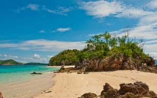 Sandy beach island trees boat - a small island in the middle of it free wallpaper