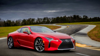 Red sports car dark sky - a dark sky in the background free wallpaper