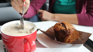 Woman eating muffin coffee table - barbizon school free wallpaper