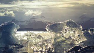Icebergs mountains sunset water landscape - a group of icebergs free wallpaper