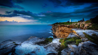 Lighthouse cliff ocean dusk cloudy - dusk free wallpaper