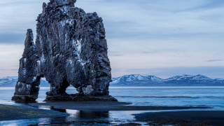 Large rock formation water mountains - dusk time free wallpaper