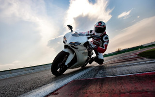 Motorcycle rider cloudy sky dynamic - dynamic camera angle free wallpaper