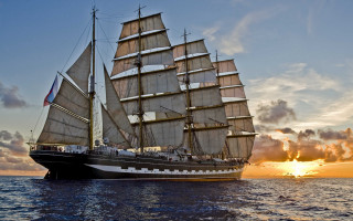 Sailboat sunset ocean clouds horizon - sunrise free wallpaper