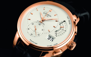 Watch gold case white dial - a black surface free wallpaper