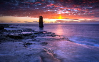 Lighthouse rocky shore sunset clouds 10 - rich moody colour free wallpaper