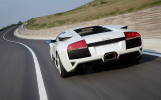 White sports car driving hillside - a hill side free wallpaper