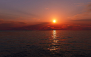 Sunset ocean boat clouds horizon 5 - a sunset over the ocean free wallpaper