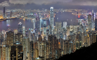 City skyline night water bridge 11 - a large city in the background free wallpaper