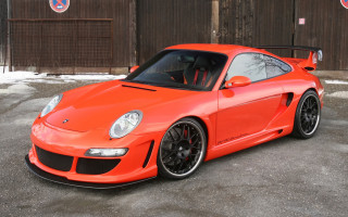 Bright orange sports car parked 6 - a parking lot next free wallpaper