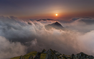 Mountain sun clouds rocks dusk - a few rock below free wallpaper