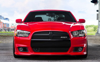 Red car trafficlight clockbuilding cobra - a parking lot next free wallpaper