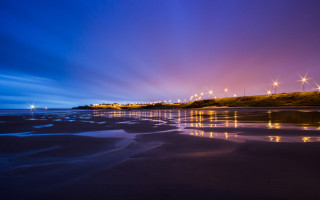 Beach lights night blue sky - a blue sky and some clouds free wallpaper