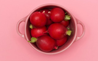Radishes bowl pink background green - a green stem free wallpaper