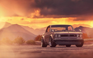 Car mountains sunset cloudy sky - cinematic free wallpaper for desktop