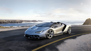 Silver sports car ocean cliff - a rocky shore free wallpaper