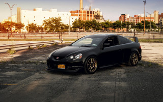 Black car parking lot cityscape - building free wallpaper for desktop