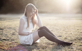 Woman sitting field sunset outdoors - sunlight free wallpaper