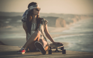 Woman dock skateboard hat ocean - a skateboard free wallpaper