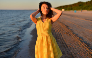 Woman yellow dress beach ocean - a yellow dress free wallpaper