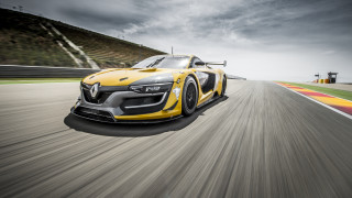Yellow sports car race track 9 - a cloudy sky in the background free wallpaper