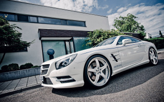 White mercedes sls cloudy sky - a sky background free wallpaper for desktop
