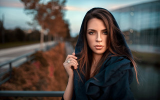 Woman hoodie tree building portrait - a tree in the background and a building in the background free wallpaper