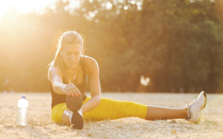 Woman yellow skirt exercising beach - her free wallpaper