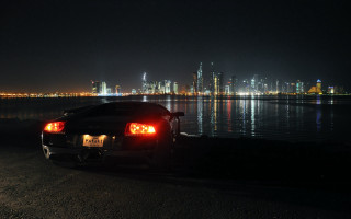 Car night cityscape reflection lights - a car free wallpaper