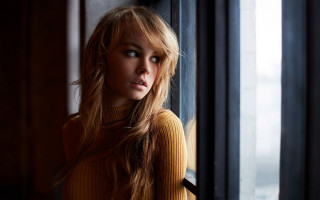 Woman long hair serious portrait 2 - natural light free wallpaper