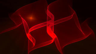 Red background red light abstract - a red light in the middle of it free wallpaper