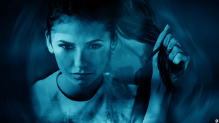 Woman holding hair serious blue - visual art free wallpaper