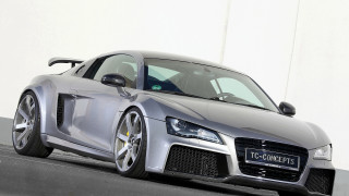 Silver sports car white wall - a white wall free wallpaper