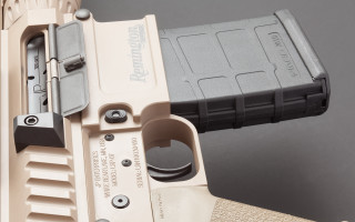 Gun closeup magazine clip precisionism - a close up of a gun free wallpaper