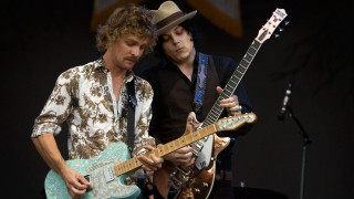 Two men playing guitars on 2 - guitar free wallpaper