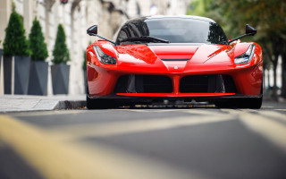 Red sports car street building - a black roof free wallpaper