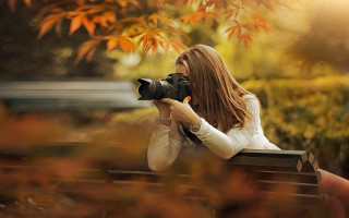 Woman autumn leaves camera blurry - a picture of herself free wallpaper