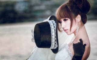 Woman white dress black hat 5 - a white dress holding free wallpaper