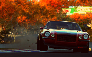 Red car autumn leaves forest - a road next free wallpaper