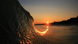Wave sunset beach city lights - caustic free wallpaper