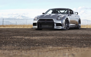 Silver sports car dirt road 5 - a dirt road in front free wallpaper