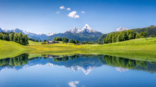 Lake mountains grassy field house - a few cloud free wallpaper