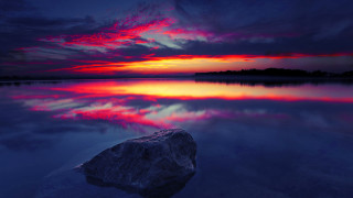 Rock water sunset mountain city - mystical free wallpaper