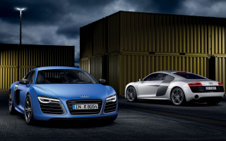 Two cars night building cloudy - a dark sky free wallpaper