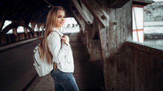 Woman white jacket backpack wooden - covered free wallpaper