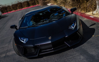 Black sports car red curb - red free wallpaper for desktop