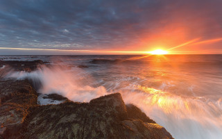 Sunset ocean waves rocks bridge - wave free wallpaper