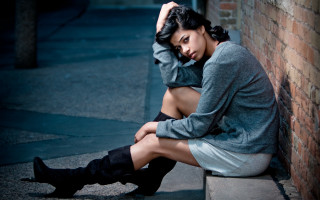 Woman sitting ledge gray sweater - a ledge free wallpaper