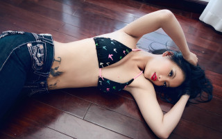 Woman bikini lying tattoo brick - a woman in a bikini free wallpaper