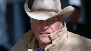 Cowboy man serious blue eyes - doug wildey free wallpaper
